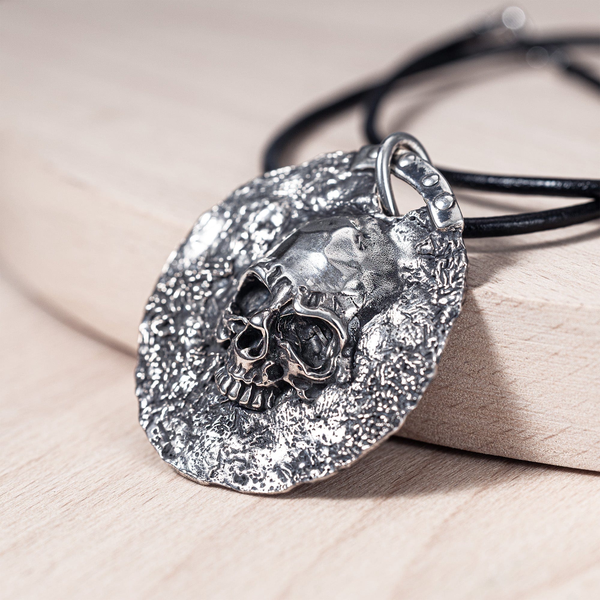 Aziel Sterling Silver Pendant with Timeworn Skull Relief