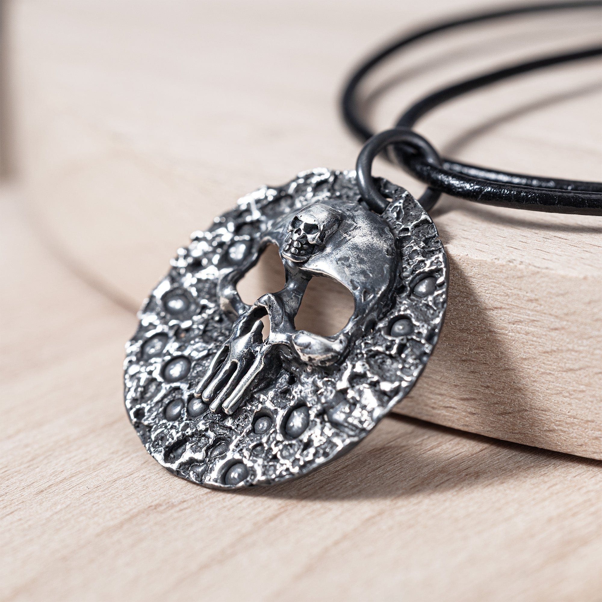 Morbidus Gritty Sterling Silver Round Pendant with Skull Emblem