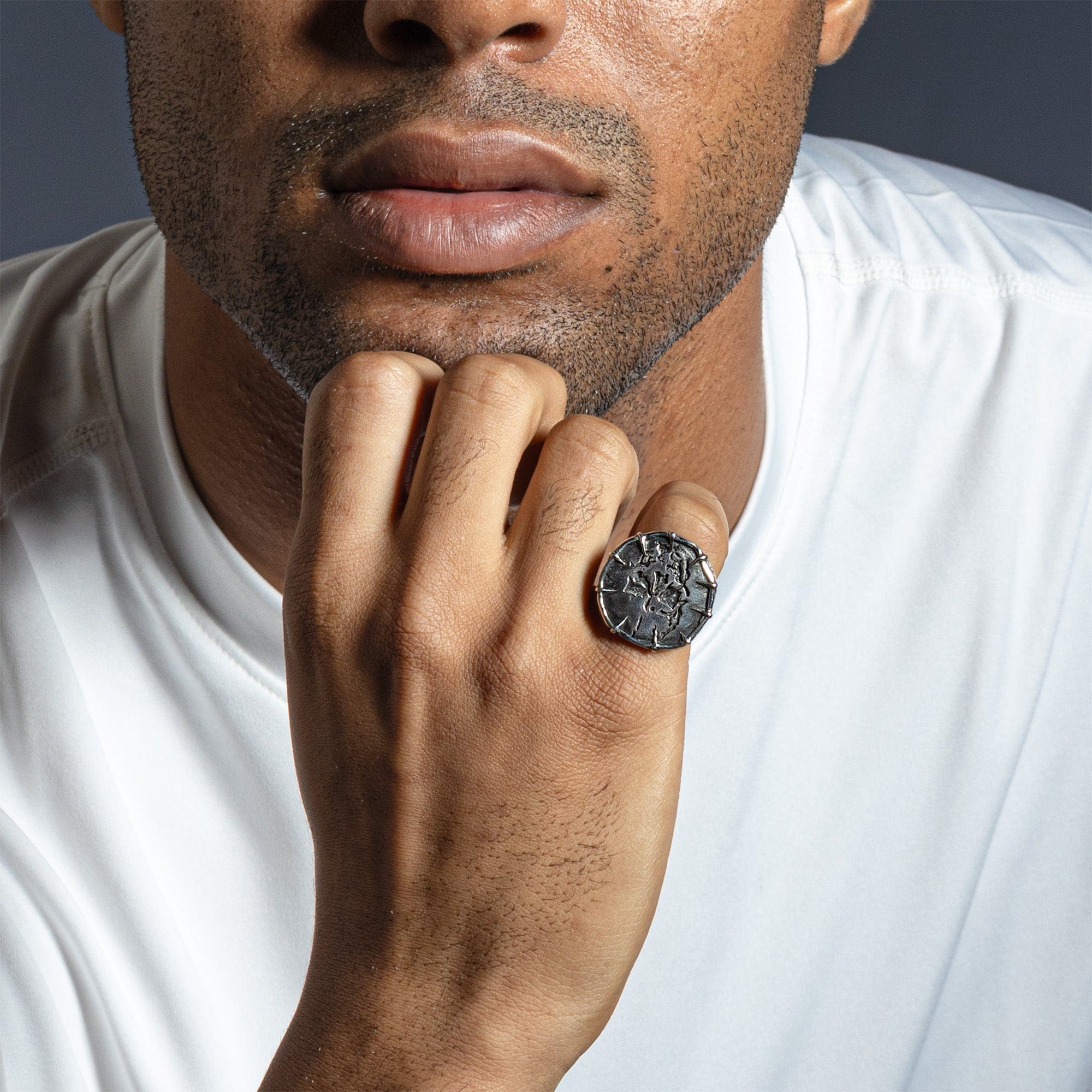Noctis Handcrafted Silver Ring with Stamped Skull Design