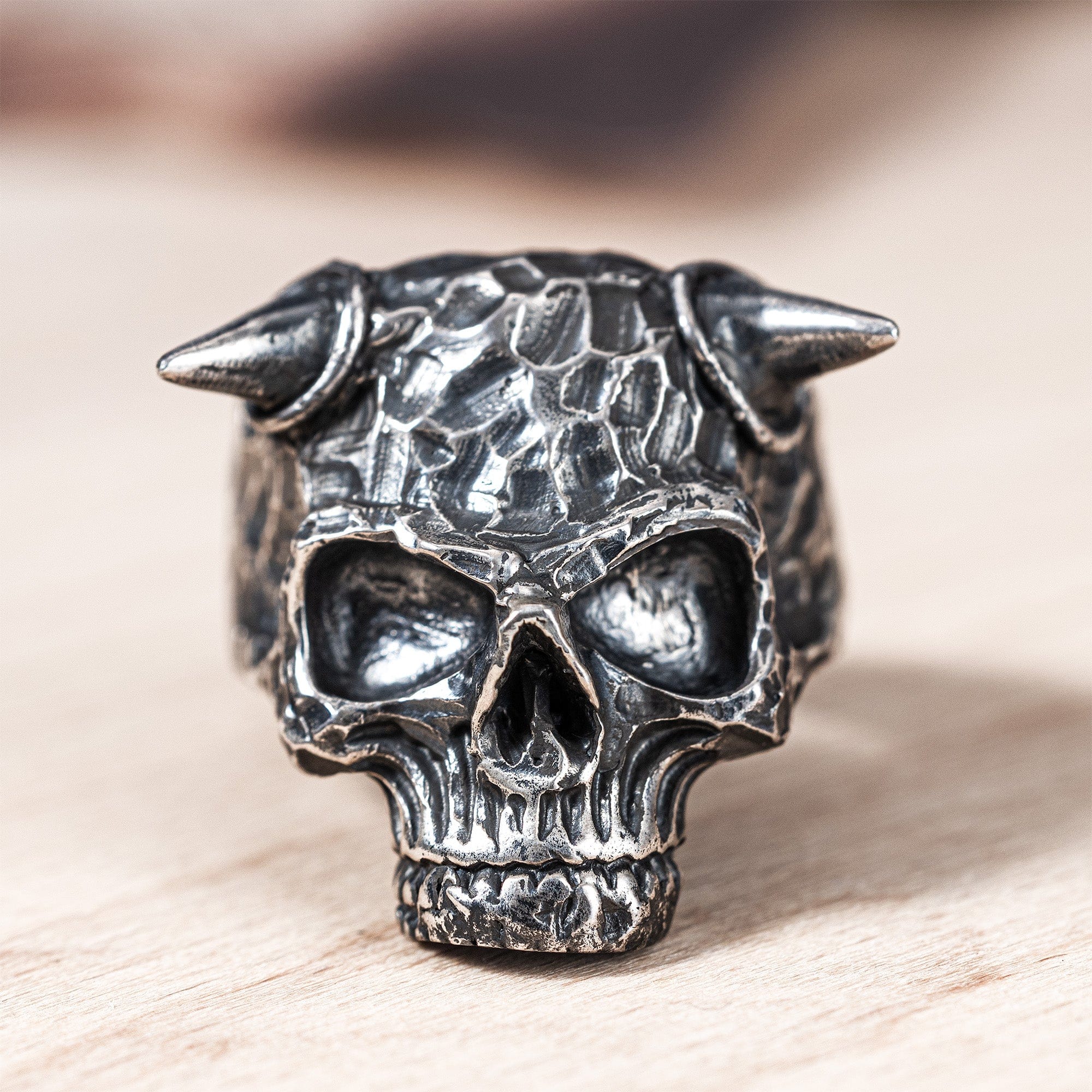 Ossicle Dark Sterling Silver Band with a Fierce Skull Design