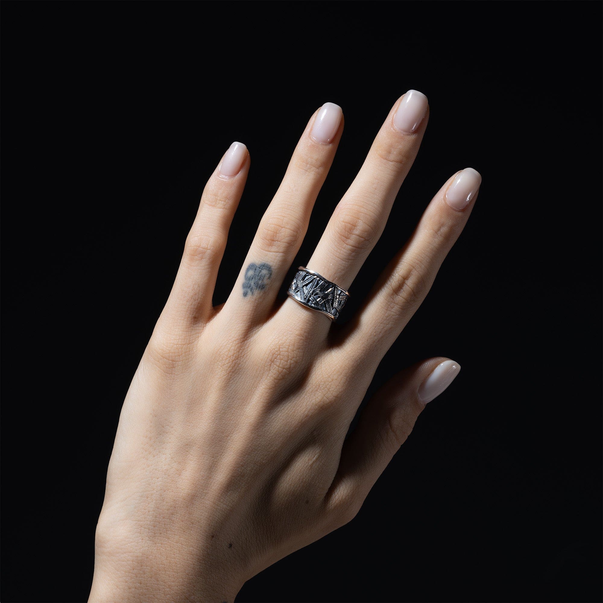 Molten Artisan Silver Ring with Etched Tribal Texture