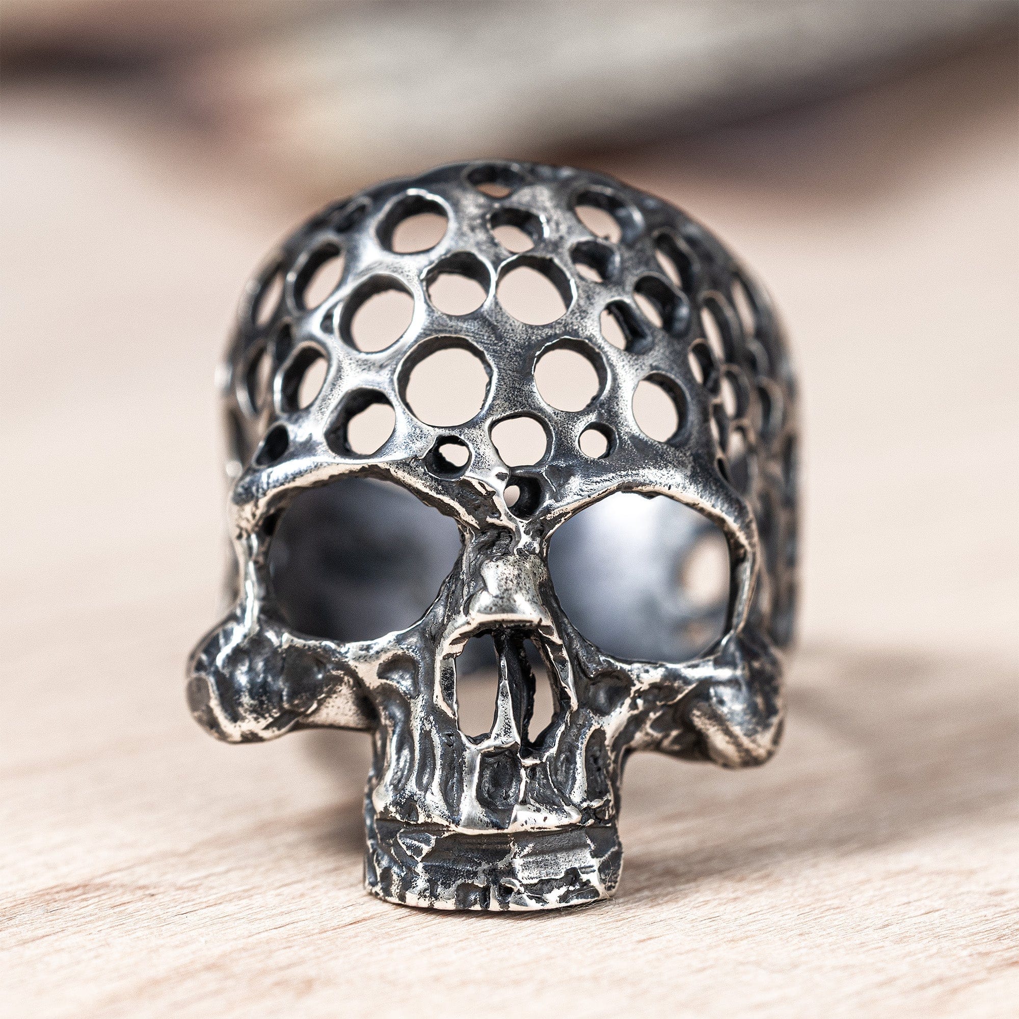 Skelter Brutalist Silver Skull Ring with Perforated Texture